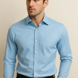 Front view of a man wearing the Ocean Breeze Blue Shirt – slim-fit, button-down style