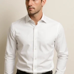 Man wearing Timeless Purity White Shirt – slim-fit long sleeve formal shirt for men, styled with black trousers, perfect for office or casual wear.