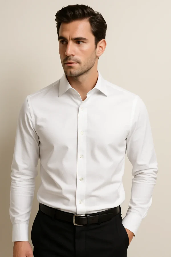 Man wearing Timeless Purity White Shirt – slim-fit long sleeve formal shirt for men, styled with black trousers, perfect for office or casual wear.